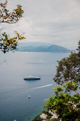Boats and yachts on the turquoise sea of Capri Island