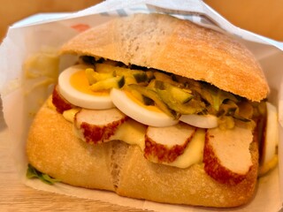 Delicious sandwich with meat loaf egg and pickles perfect for a quick lunch or snack