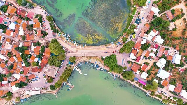 4k drone video of stunning peninsula Golyazi surrounded by fishing boats.Nilufer in Bursa, Turkiye.