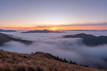  sunrise over a sea of clouds from a mountain peak, showcasing a serene and vast landscape