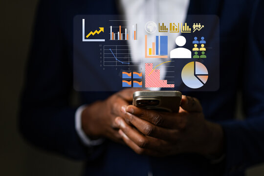 African professional analyst reviewing a business intelligence dashboard on a smartphone, tracking global sales performance and customer data analytics on a virtual interface. - Powered by Adobe