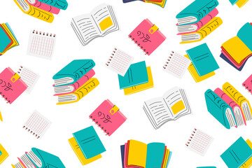 Colorful pattern of books and notebooks on white background.