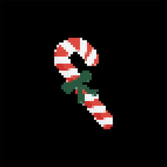 Fototapeta premium Mosaic pixel candy cane with a green bow, showing a festive, retro design in a cartoon style.