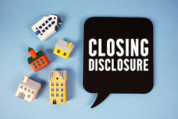 CD Closing Disclosure text with house models on blue background
