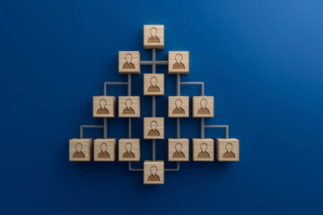 Pyramid Style Hierarchy Diagram With Wooden Blocks Connected Together On Blue Background