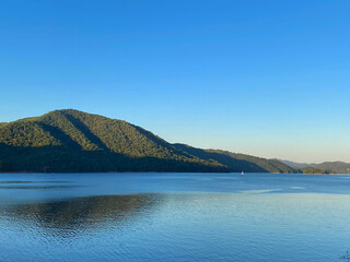 Island with Sun and blue SKy