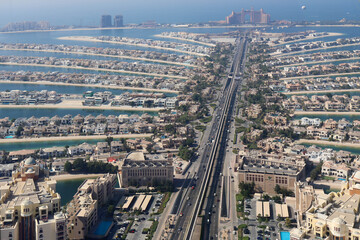 Palm Jumeirah island views with luxury hotels, resorts, and unique palm-shaped design in Dubai.