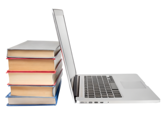 Stack of books with laptop on table