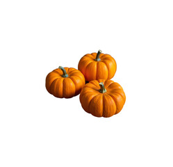 Three small orange gourds arranged closely together on a dark surface