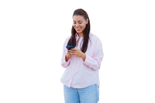 Female professional texting on smartphone, long brunette hair, pink top, denim, white background