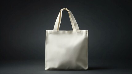 An isolated blank white tote bag for branding mockup purposes.
