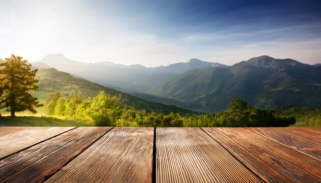 wooden table outdoors with mountain view