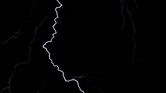 intense lightning bolts across a dark night sky during storm