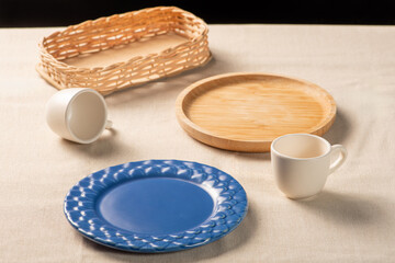 Table with empty rustic utensils from Brazil, selective focus.