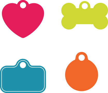 A collection of four colorful pet ID tags in various shapes including heart bone rectangle and circle with holes for attachment