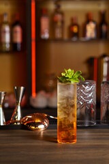 Double layer drink with ice in a bar in a glass