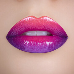 Obraz premium Lips with ombre lipstick in pink and purple blend