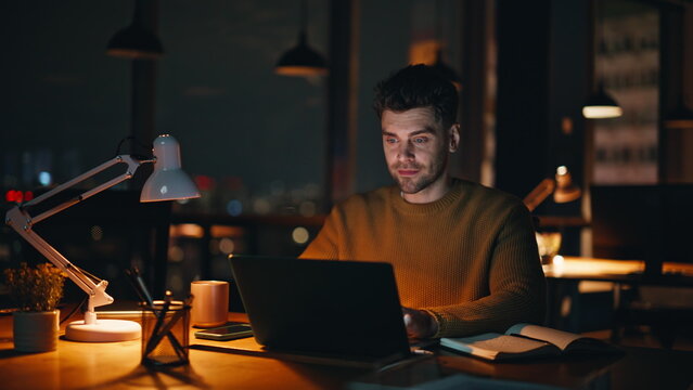 Successful manager working night creative agency office closeup. Smiling man