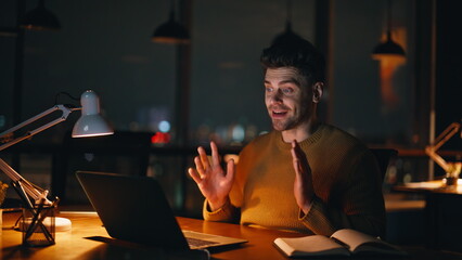 Consultant video calling night workspace closeup. Businessman online meeting