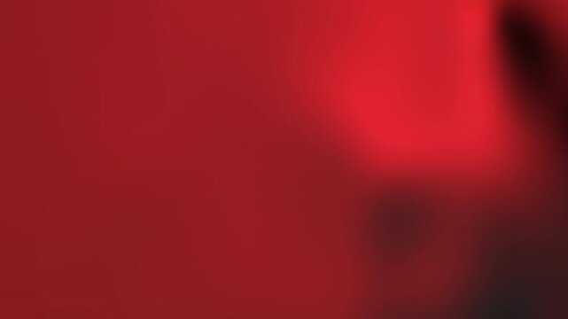 Flowing deep red fabric with black shadows, suitable for fashion websites, holiday promotions, elegant designs, and dramatic black and red backgrounds.