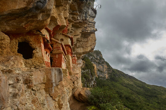 The painted mausoleums of Revash cling to the cliffs of Chachapoyas, eternal guardians of an ancient culture carved into stone and memory