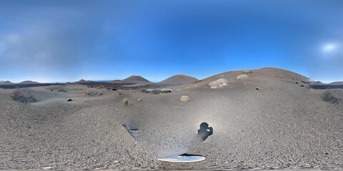 Volcanic mountain landscape panorama on Lanzarote, Canary Islands, showing dramatic terrain and arid natural beauty Spain