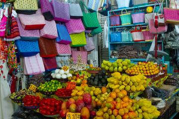 Fruits vegetables and bags and totes in Mercado in Mexico