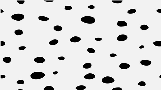 Black spots on a white background. Trendy seamless animal skin print.