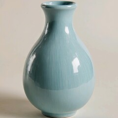 Title:
Light blue ceramic vase with inverted drop shape, glossy surface and subtle vertical lines