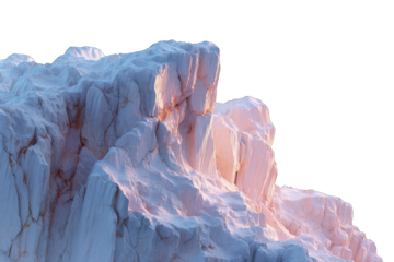 Glacial rock face illuminated by dawn light