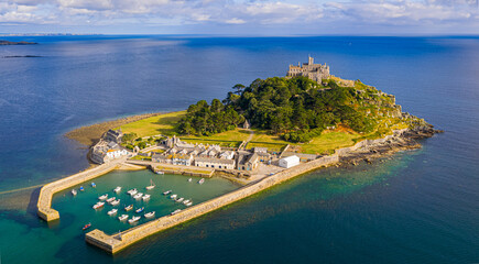 Aerial view of St Michael&rsquo;s Mount island with harbor, boats, and castle