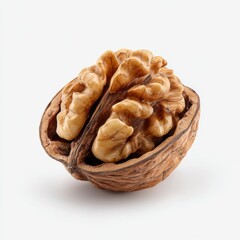 A macro shot of a walnut cracked open, revealing the delicious nutmeat within. The details of the shell and the nut's texture are clearly visible