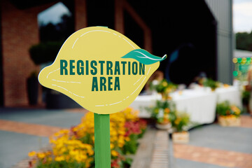 Sign indicating registration spot at event