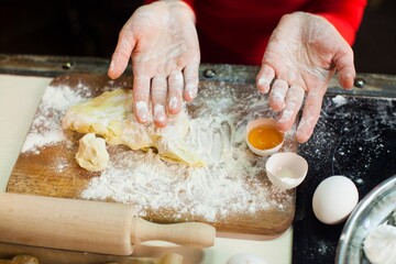 woman preparing dough for baking