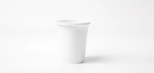 Clean white disposable plastic cup on white background, clean, juice