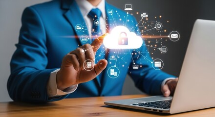 Man in suit touching cloud icon with laptop and network connections visible on wooden desk surface