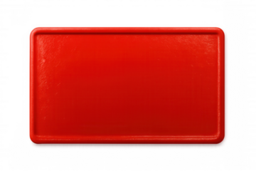 Red rectangular plastic plate isolated on transparent background, creating a vibrant and striking visual