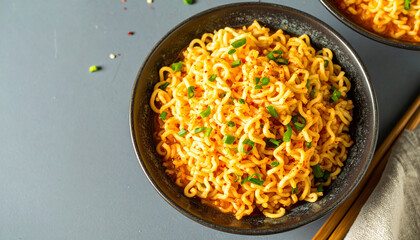 Delicious Bowl of Noodles: A tantalizing close-up showcases a beautifully plated bowl of savory noodles. The dish, glistening with flavor and texture, hints at an unforgettable culinary experience.