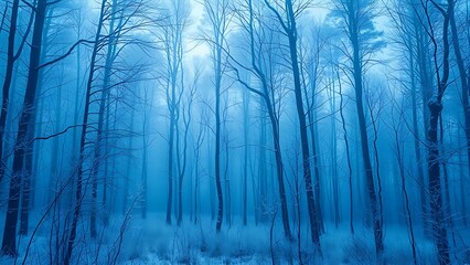 Obraz premium Misty winter forest in cool blue hues, painted with a dreamy watercolor aesthetic.