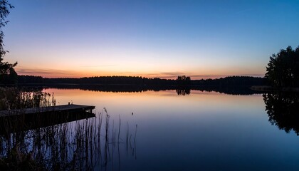 Tranquil lake sunrise, peaceful reflection