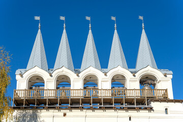 Belfry of the ancient Assumption Monastery close-up. Tikhvin, Leningrad region, Russia
