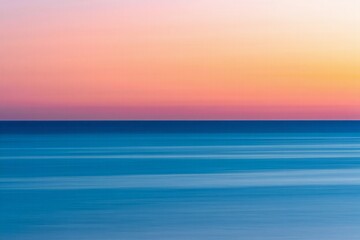 Obraz premium Beach Background Serene Seascape Calm Ocean Water at Sunset with Pastel Sky