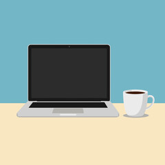 Laptop and coffee cup on a desk with blue and yellow background.