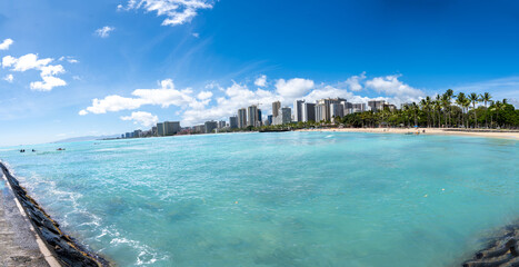  view of Waikiki Beach, Honolulu, Hawaii, with vibrant sunset skies, turquoise waters, and beachfront hotels. Perfect for travel, vacation, tourism, and real estate marketing content.