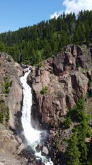 Waterfall cascading down rocky cliffs (4)