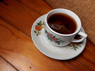 cup of tea on wooden table