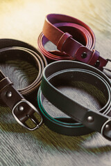 Obraz premium Explore our exquisite collection of stylish leather belts, available in a variety of colors and textures, perfect for enhancing your fashion accessories while serving practical daily needs