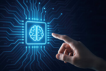 Hand pointing at glowing blue brain icon on a digital circuit board image photo