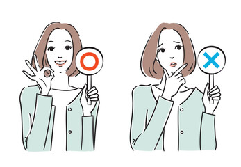 正解か不正解か札でジャッジする綺麗な女性