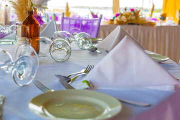 Traditional Greek restaurant in Paphos, Cyprus — whitewashed walls, blue accents, and blooming flowers set the scene for delicious local cuisine in a charming Mediterranean atmosphere.